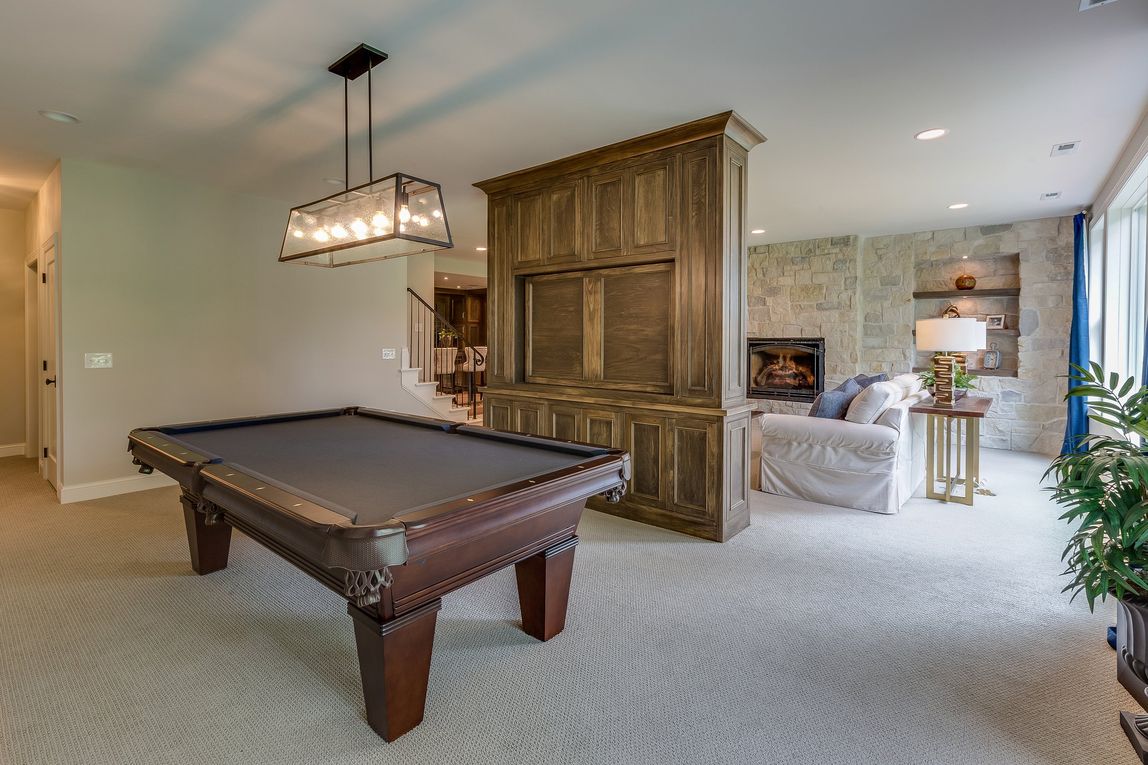 Game room in basement of new home